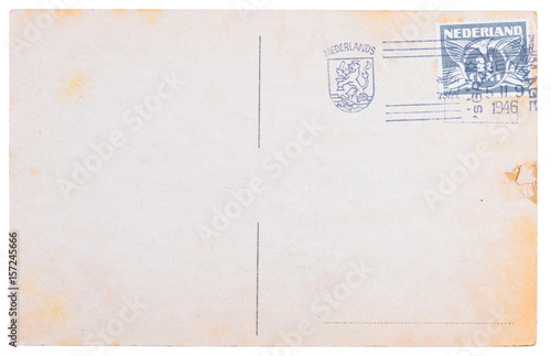 Vintage blank postcard with Dutch meter stamp from 1945 and Netherlands coat of arms stamp