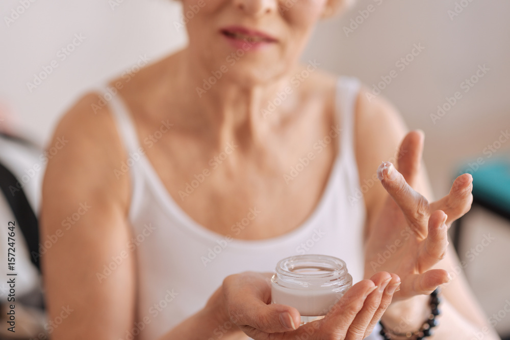 Model handing new useful cream Model handing new useful cream