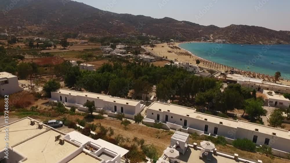 Aerial drone video of Mylopotas veach with turquoise waters, Ios island, Cyclades, Greece Aerial drone video of Mylopotas veach with turquoise waters, Ios island, Cyclades, Greece