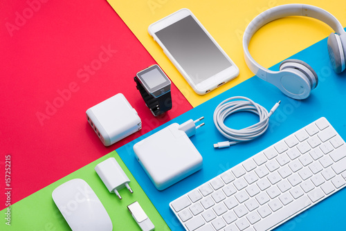 Well organised white office objects on colorful background