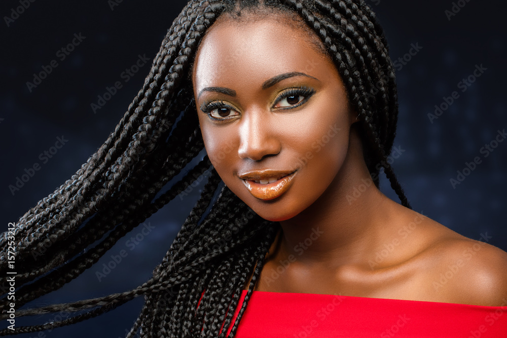 Cosmetic beauty portrait of young african girl with braids. - obrazy, fototapety, plakaty 