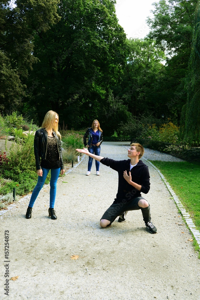 Love triangle in Vilnius town Bernardinu garden on autumn