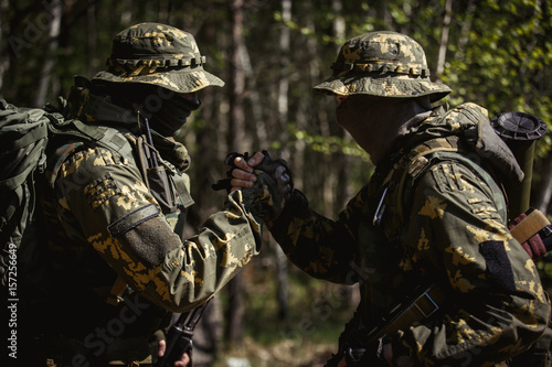 Two military men shaking hands