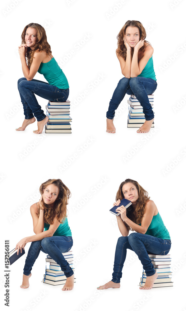Fototapeta premium Student sitting on stack of books