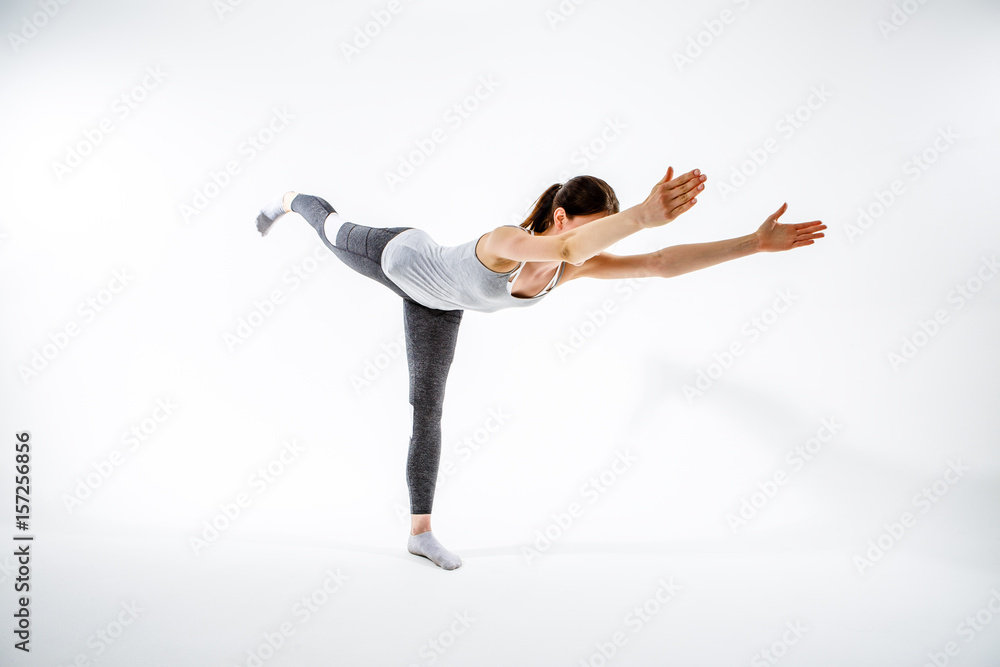 Girl balances on one leg Girl balances on one leg