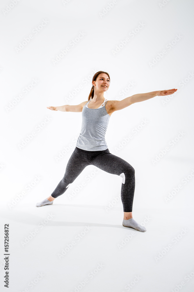 Young woman exercising in yoga Young woman exercising in yoga
