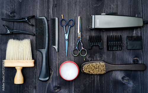 Obraz na plátně Hairdresser tools on wooden background