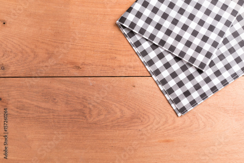 Tablecloths on the wooden table background