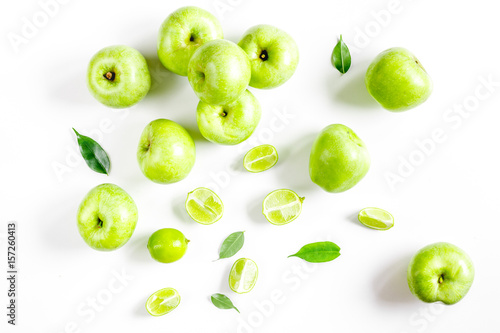 fitness food with green apples on white background top view