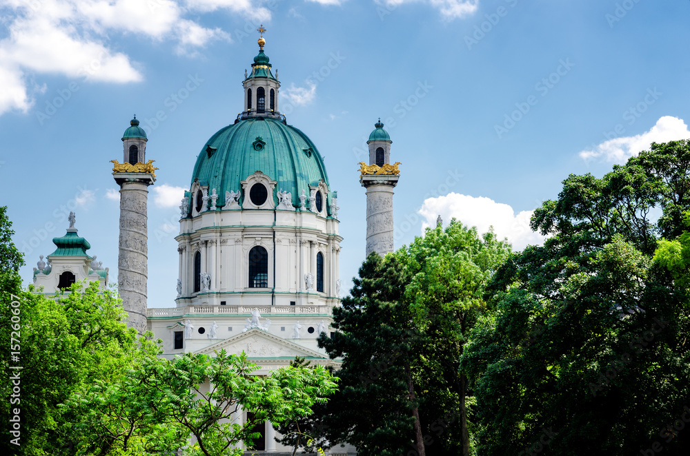 the facade of the Karlskirche (Saint Charles Church) in Vienna, Austria, seen from the public gardens of Karlsplatz 