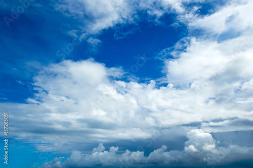 blue sky background with tiny clouds © Pakhnyushchyy