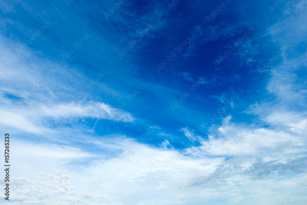blue sky background with tiny clouds blue sky background with tiny clouds