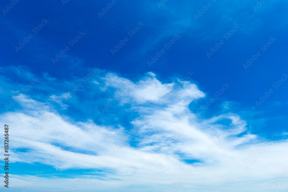 Fototapeta premium blue sky background with tiny clouds