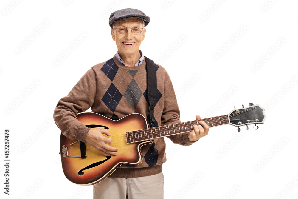 Obraz premium Elderly man playing guitar