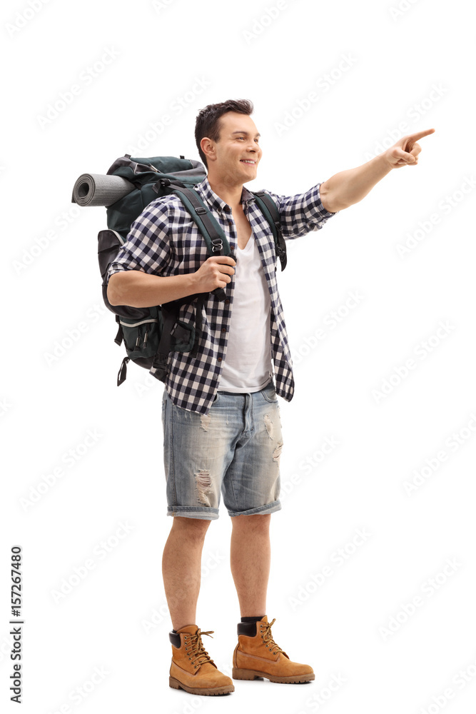 Hiker pointing with his finger isolated on white background Hiker pointing with his finger isolated on white background