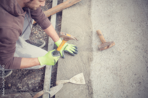 Renovating concrete pavement in home / budget DIY version.