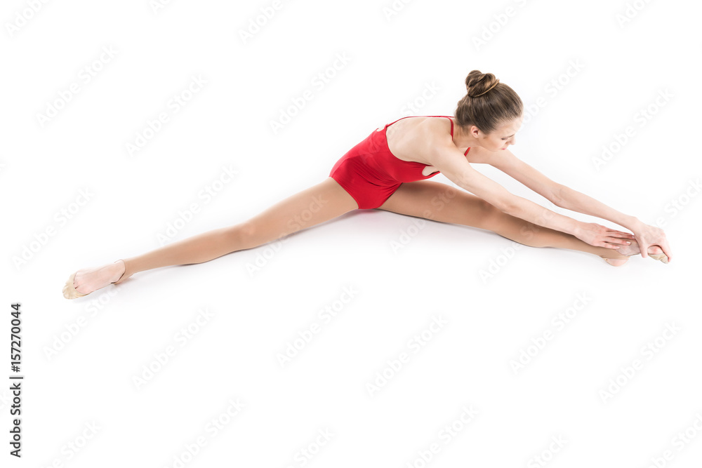 fit rhythmic gymnast stretching before training isolated on white fit rhythmic gymnast stretching before training isolated on white