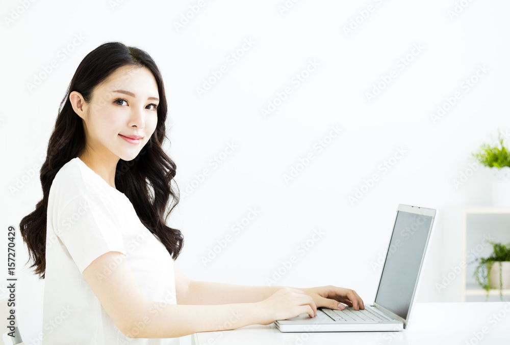 beautiful young smiling woman with laptop beautiful young smiling woman with laptop