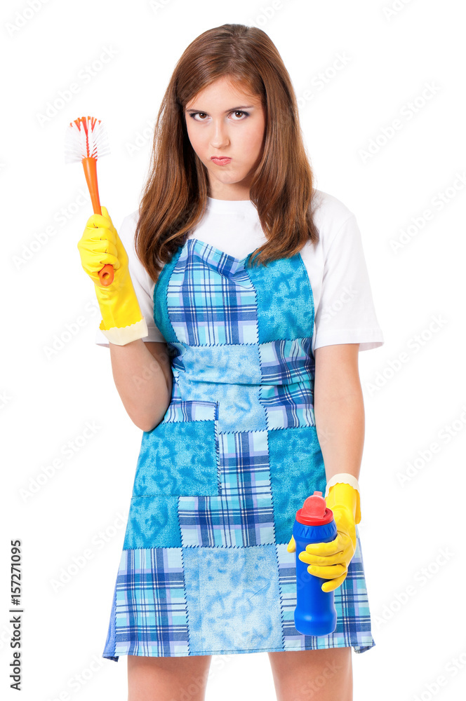 Tired young woman holding bottle of chemistry for cleaning house. Cleaning concept. Beautiful girl with cleaning tools and products on white background. Housekeeper isolated portrait. Tired young woman holding bottle of chemistry for cleaning house. Cleaning concept. Beautiful girl with cleaning tools and products on white background. Housekeeper isolated portrait.