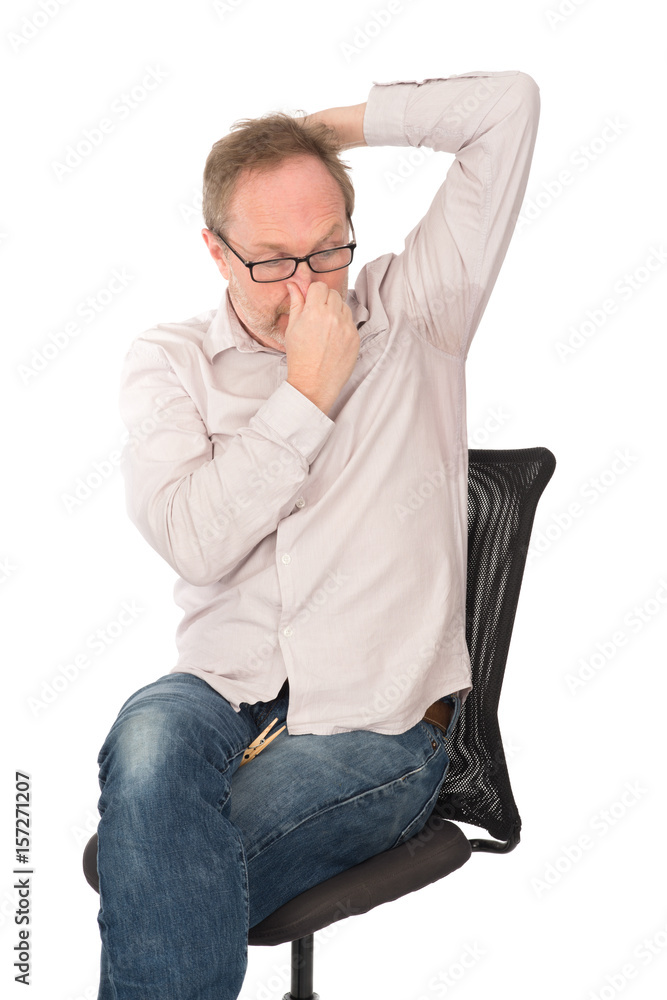 Man with Sweaty and Smelly Underarm Covering His Nose Man with Sweaty and Smelly Underarm Covering His Nose