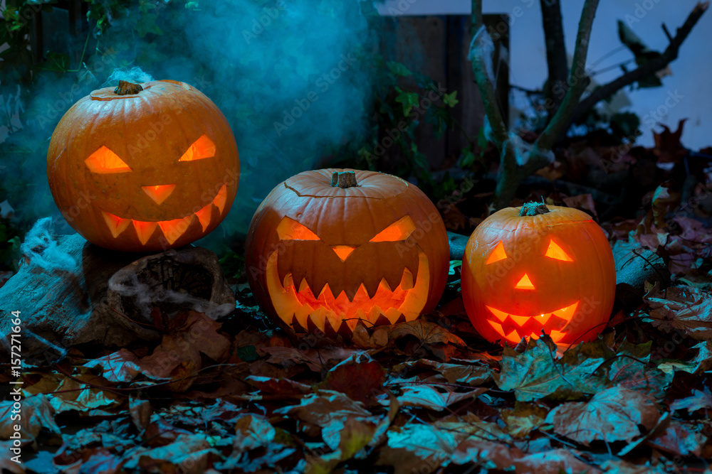 Three Glowing Jack-o-Lanterns Three Glowing Jack-o-Lanterns