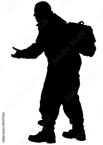 Soldier in uniform with weapon on white background