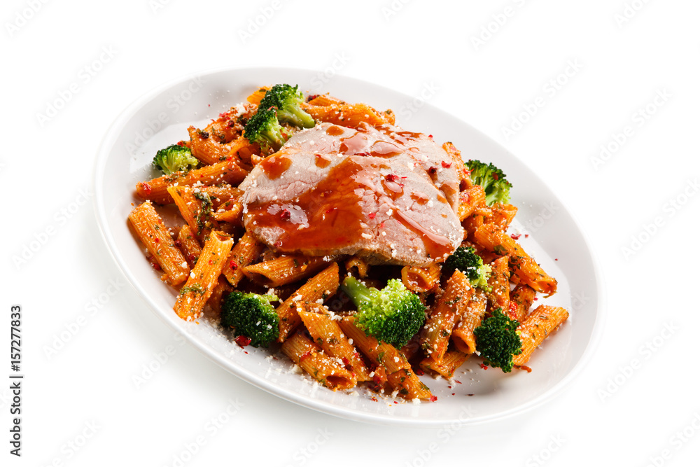Pasta with meat, broccoli and tomato sauce on white background Pasta with meat, broccoli and tomato sauce on white background