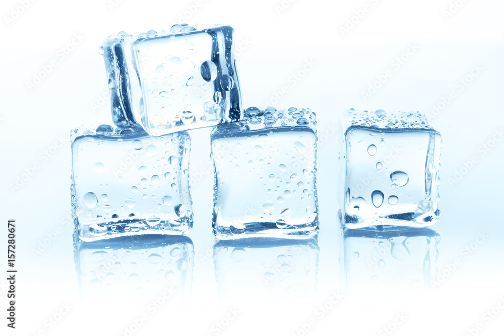 Transparent ice cubes group on white background with water drops Transparent ice cubes group on white background with water drops