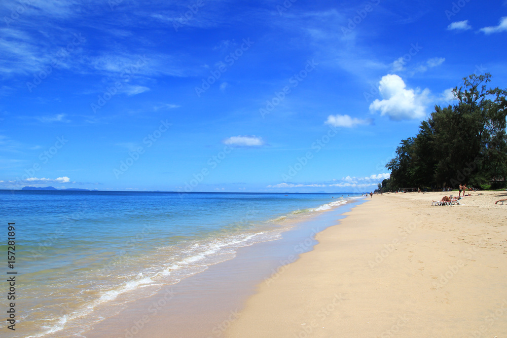 Travel to Island Koh Lanta, Thailand. The view on a beach with sea, blue sky and white sand on a sunny day.