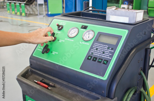 Man's Hand Working With Nitrogen Tire Filling System Machine.