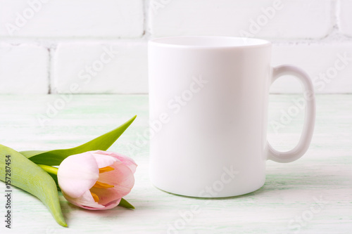 White coffee mug mockup with pink tulip