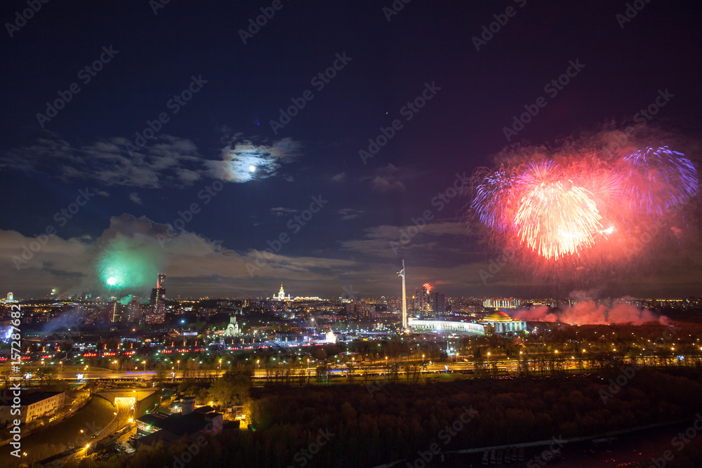Bright fireworks explosions in night sky in Moscow, Russia