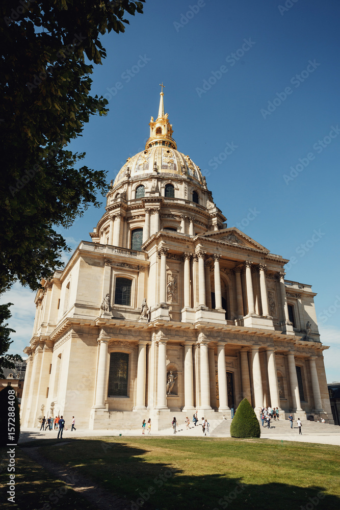 Building of Les Invalides under blue sky in Paris
