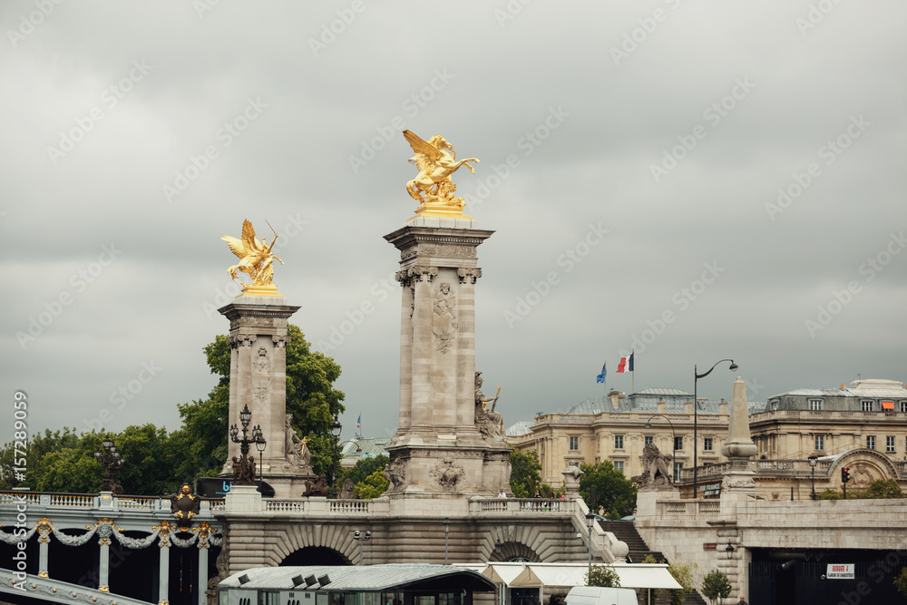 Golden statues on the Pont Alexandre III bridge