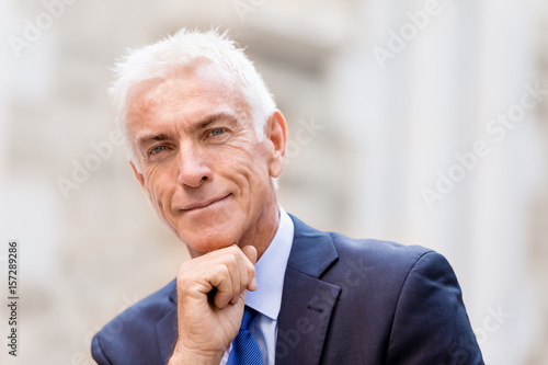 Wallpaper Mural Portrait of confident businessman outdoors Torontodigital.ca