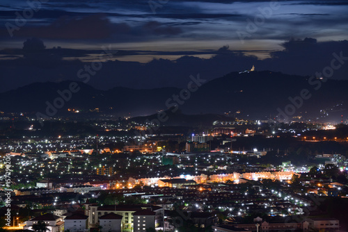 viewpoint on hill see to phuket town in twilight © Jiggo_Putter