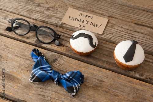 Happy fathers day text by decorated cupcakes  photo