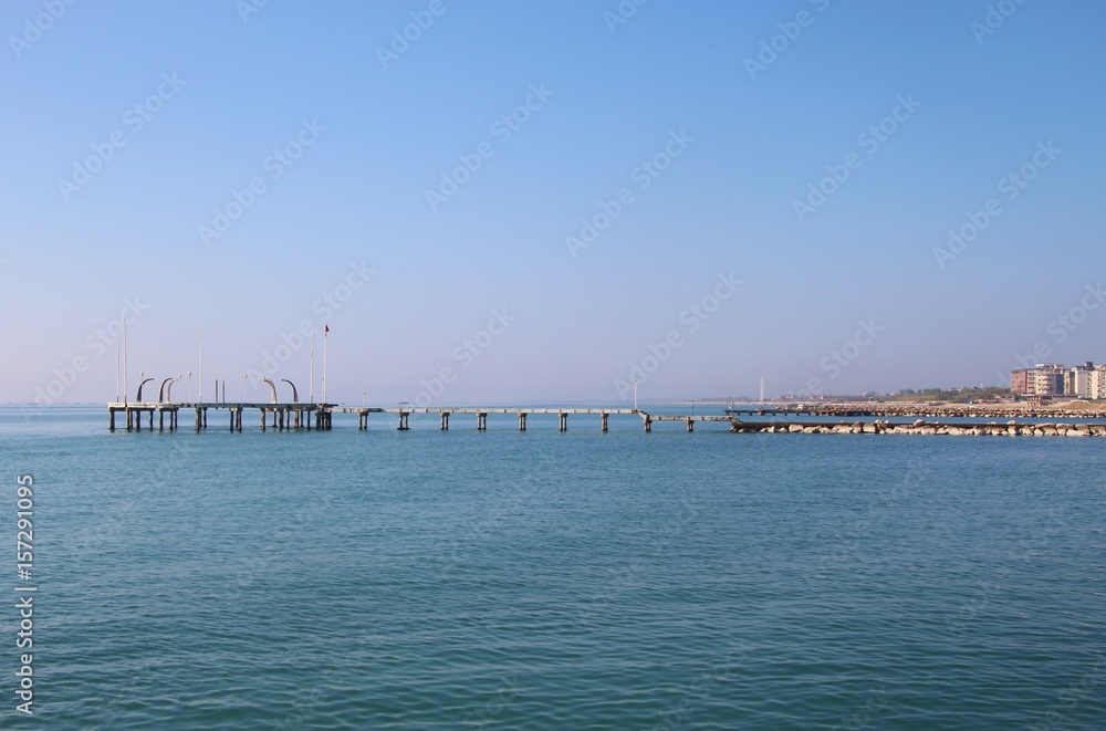 Pier on the island Lido di Venezia, Venice, Italy, Europe. Pier on the island Lido di Venezia, Venice, Italy, Europe.