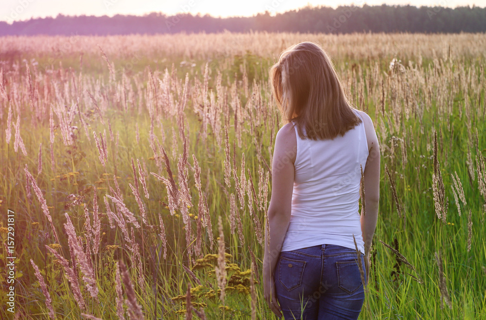 Beautiful blondie lady in field at sunset, feels happy. Instagram Beautiful blondie lady in field at sunset, feels happy. Instagram