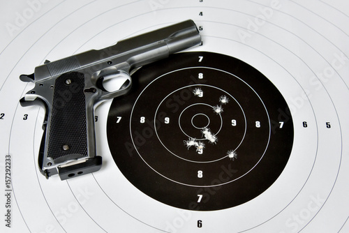 handgun and shooting target