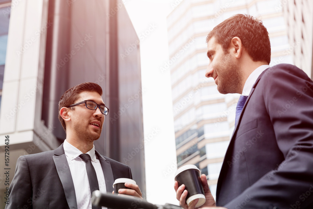 Two businessmen talking outdoors Two businessmen talking outdoors