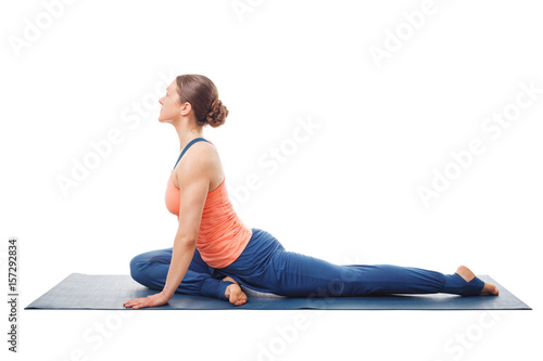 Woman doing yoga asana Eka pada kapotasana
