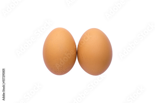two eggs are stack put on isolated on white.
