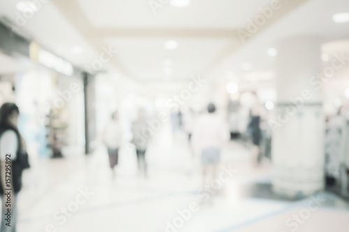 Blurred image background, people at shopping mall blur background with bokeh and vintage tone. © tortoon