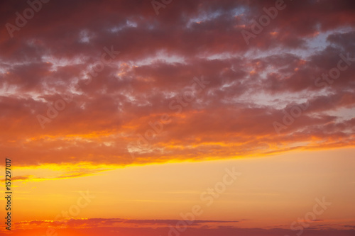 Fiery  orange and red colors sunset sky as background