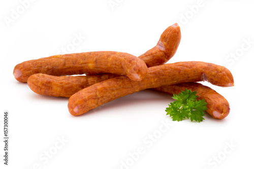 Stack of smoked sausages isolated on a white background.