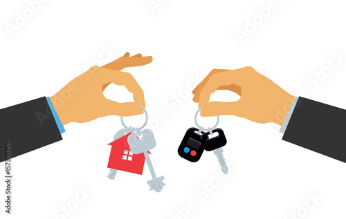 human hands holding car and house keys on white background