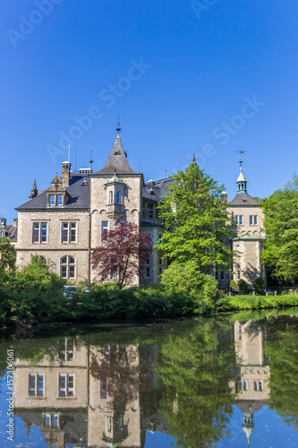 Towers of Castle Buckeburg with reflection in the water