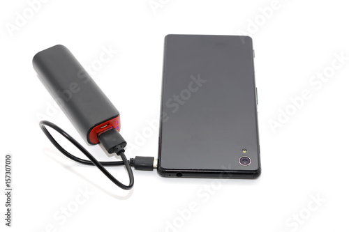 Black smart phone charger with power bank battery bank on white background with clipping path