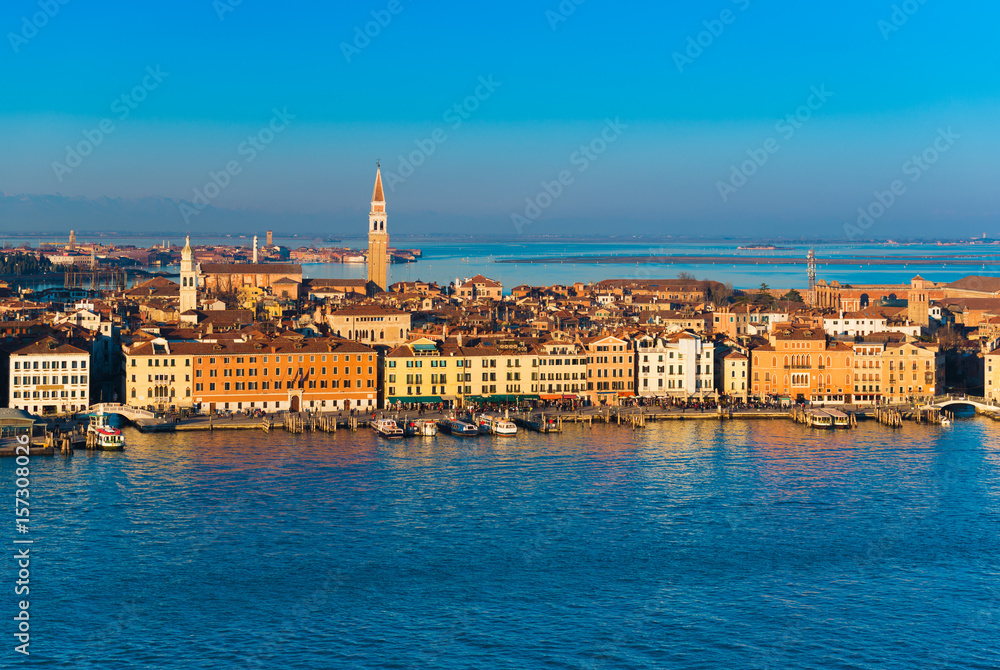 Venice cityscape at sunset, panorama of the city in the evening, Italy